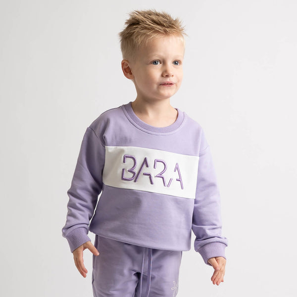 Jumper for kids in purple with logo and loose fit from Bara Sportswear